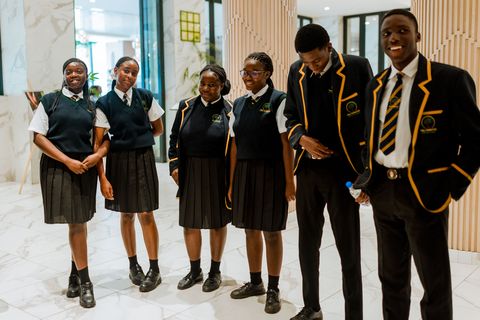 Uniformed learners gathered in the hotel lobby
