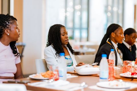 Learners seated together at the hotel restaurant