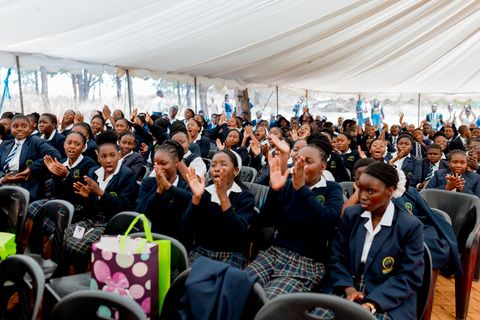 Firm Foundation learners applauding at prize giving