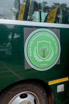 The Firm Foundation crest on the school bus at the CIMAS visit